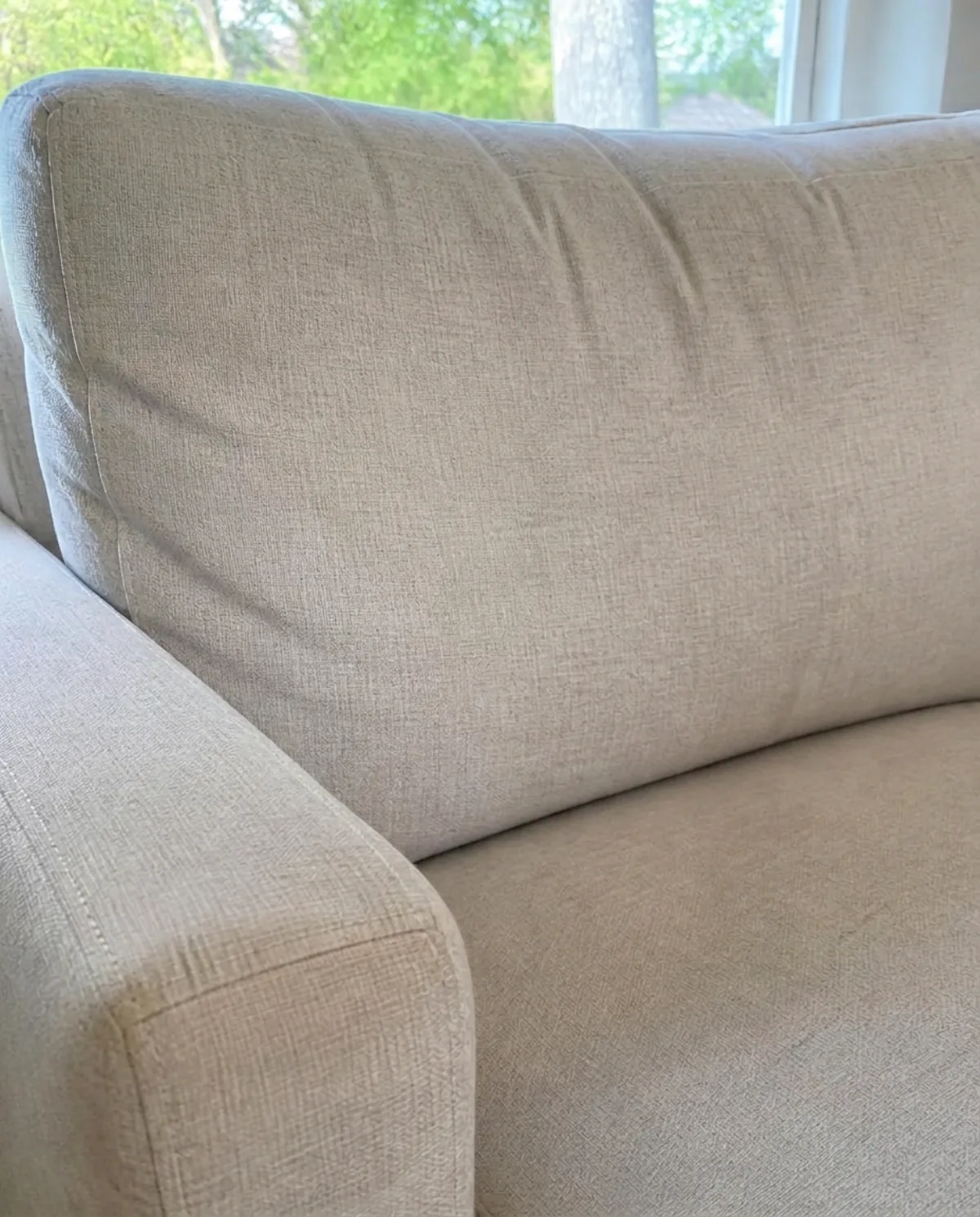 Cream sofa cushion after treatment, clean fabric