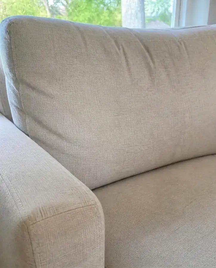 Cream sofa cushion after treatment, clean fabric